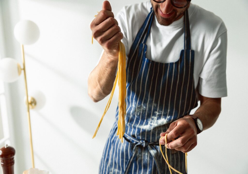 Claudio with spaghetti